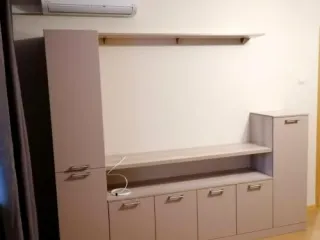 ТВ зона из МДФ бежевого цвета
